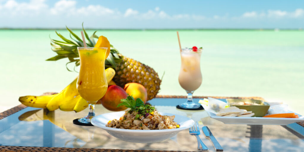 OB-Honeymoon-Food-Drinks Belize Honeymoon Package dining by the sea